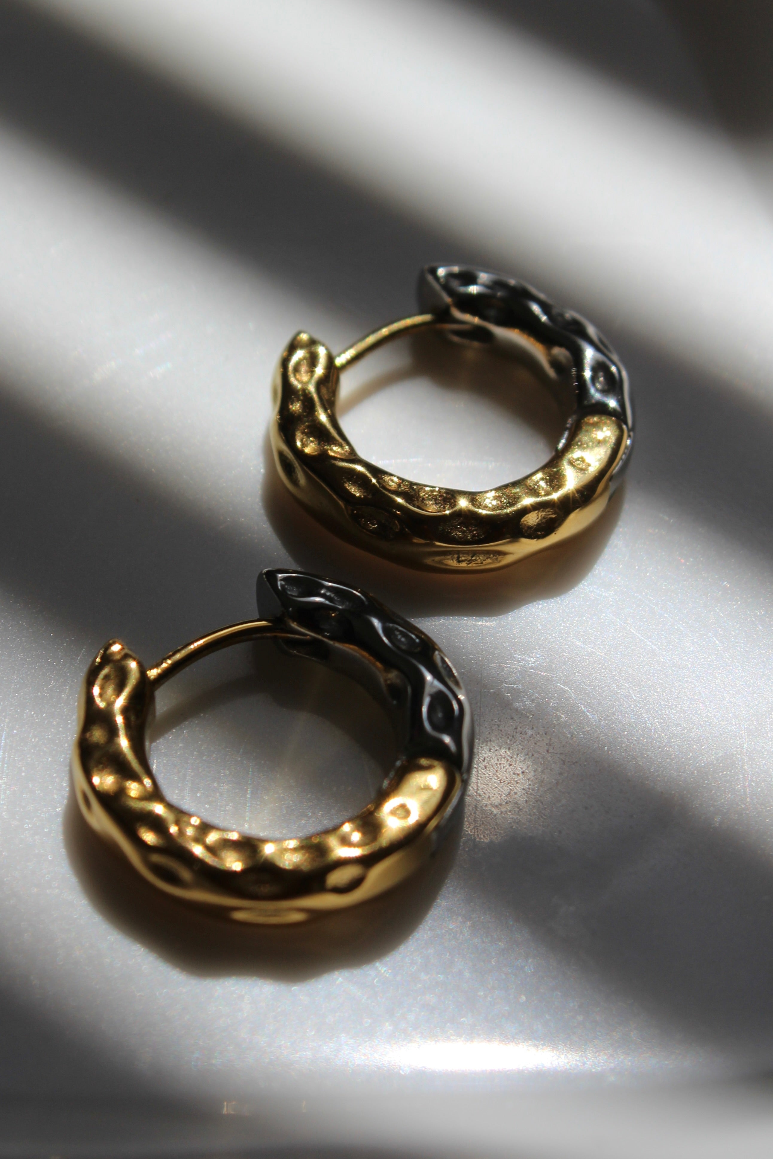 The Mixed Metal (Silver/gold) Hammered Harriet Hoop Chunky Earrings.