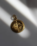 Gold Compass Charm.
