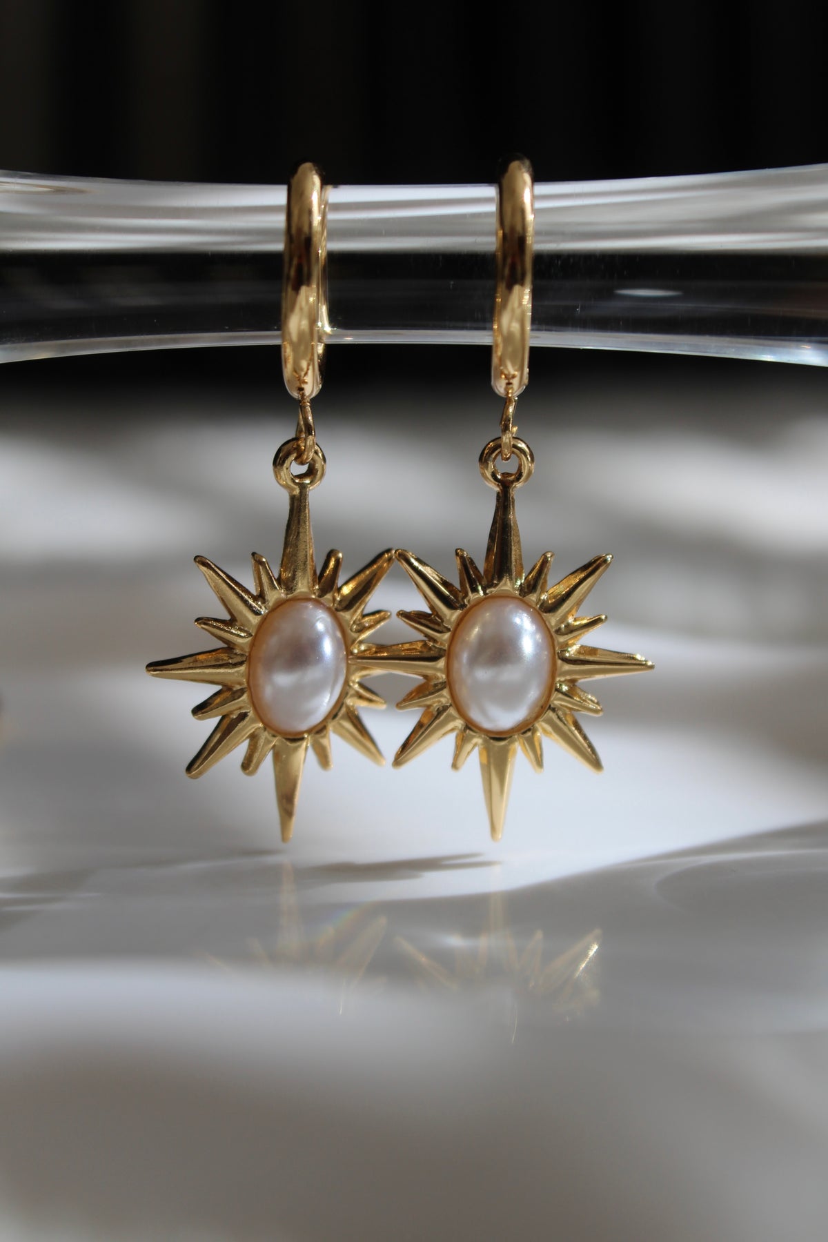 The Solana Celestial Sun Hoop Earrings.