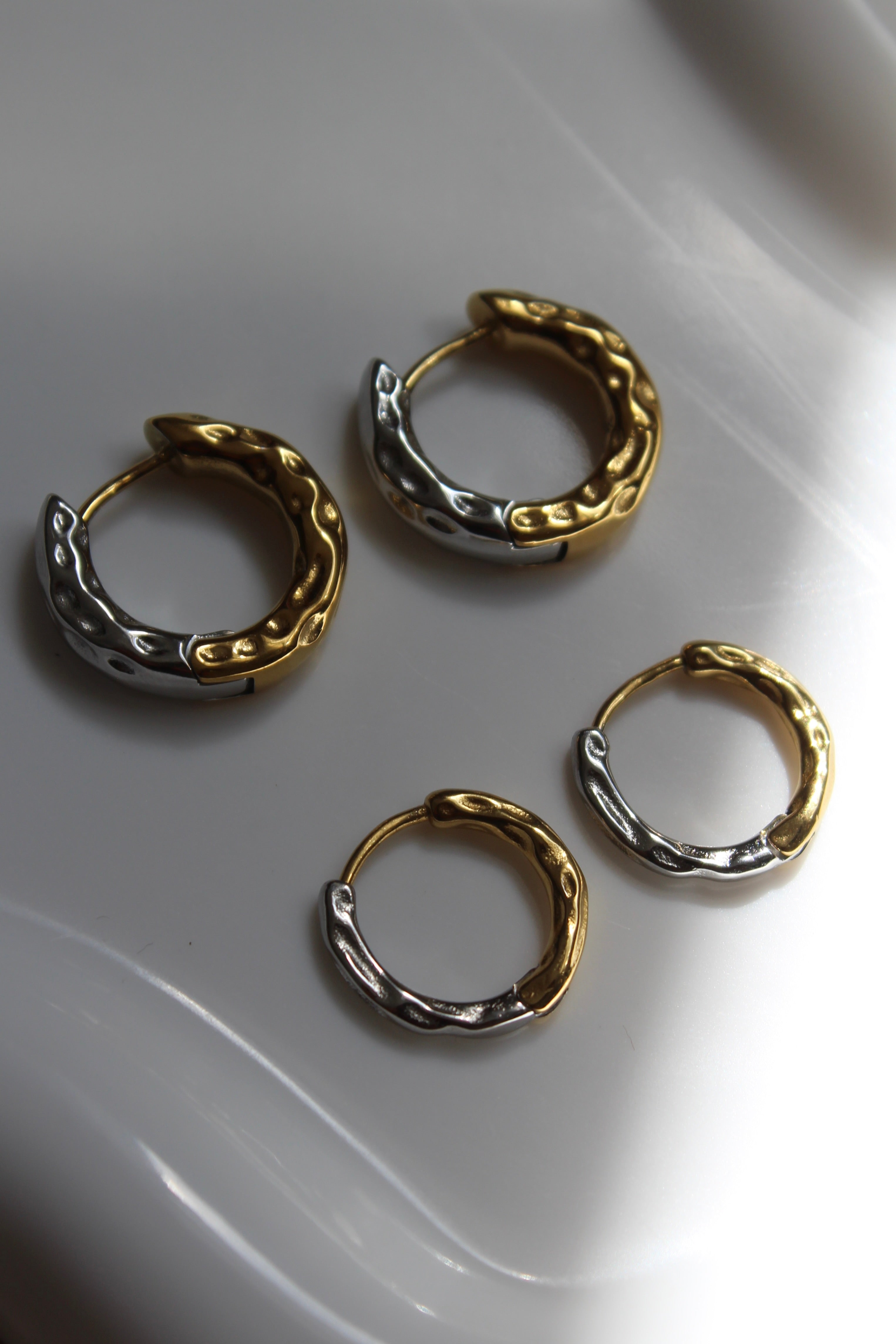The Mixed Metal (Silver/gold) Hammered Harriet Hoop Chunky Earrings.