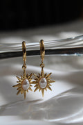 The Solana Celestial Sun Hoop Earrings.