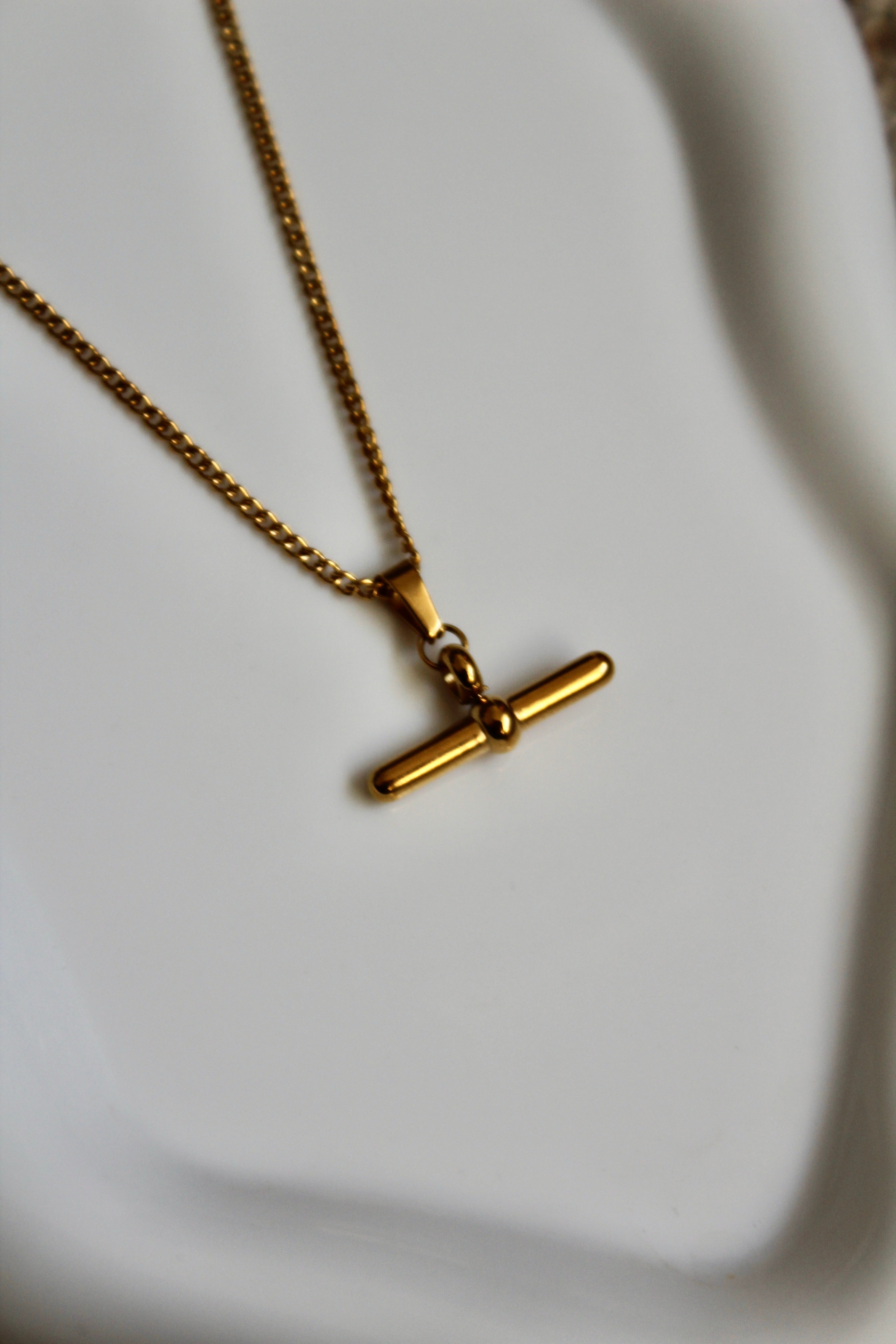 The Kelly T-Bar 18K Gold Necklace.