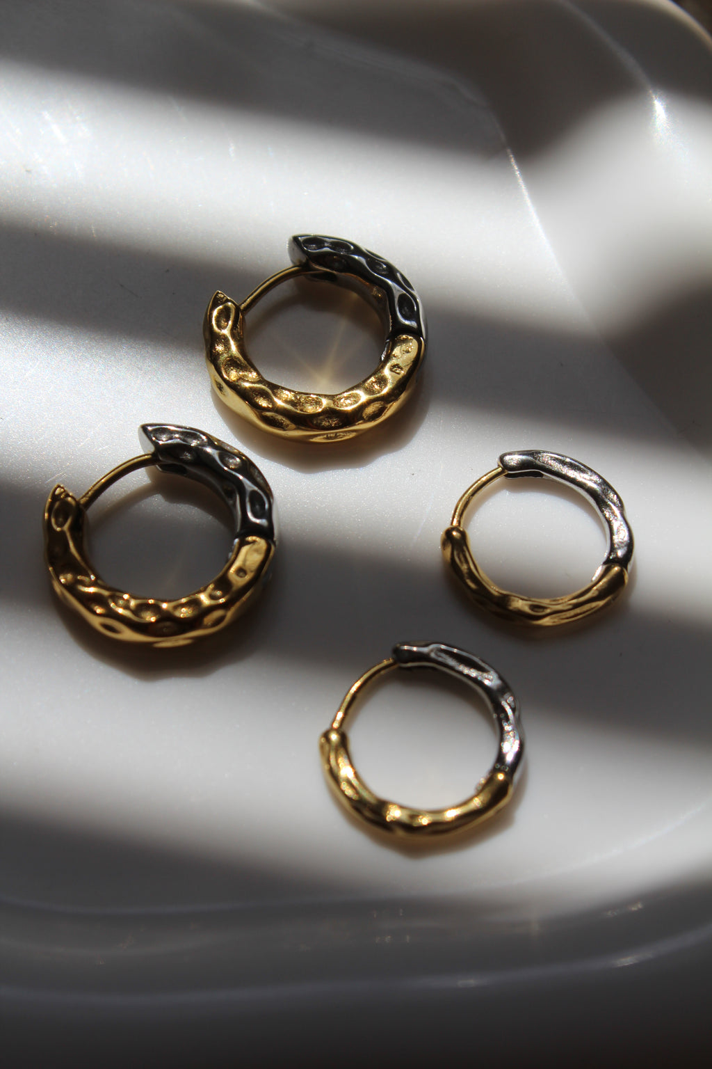 The Mixed Metal (Silver/gold) Hammered Harriet Hoop Chunky Earrings.