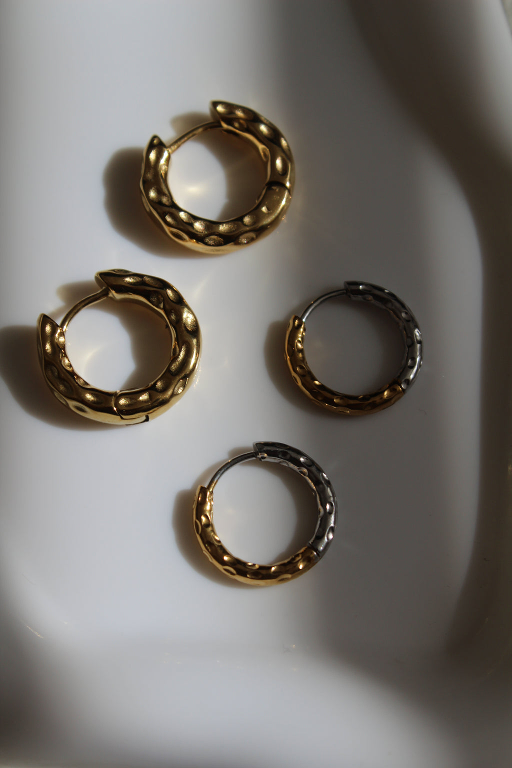 The Mixed Metal Hammered Harriet Slim Hoop Earrings.