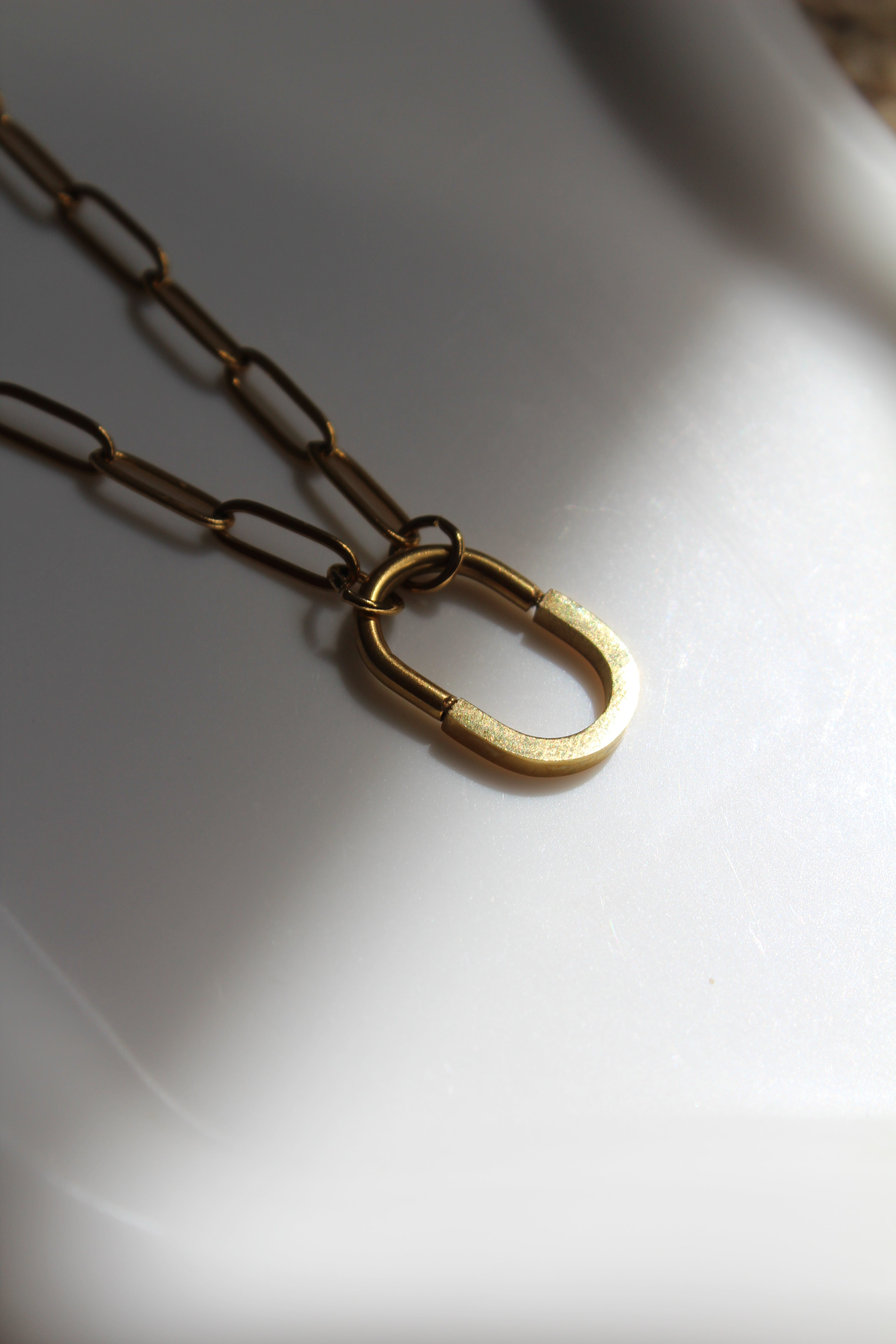 The Victoria Oval Pendant 18K Gold Necklace.