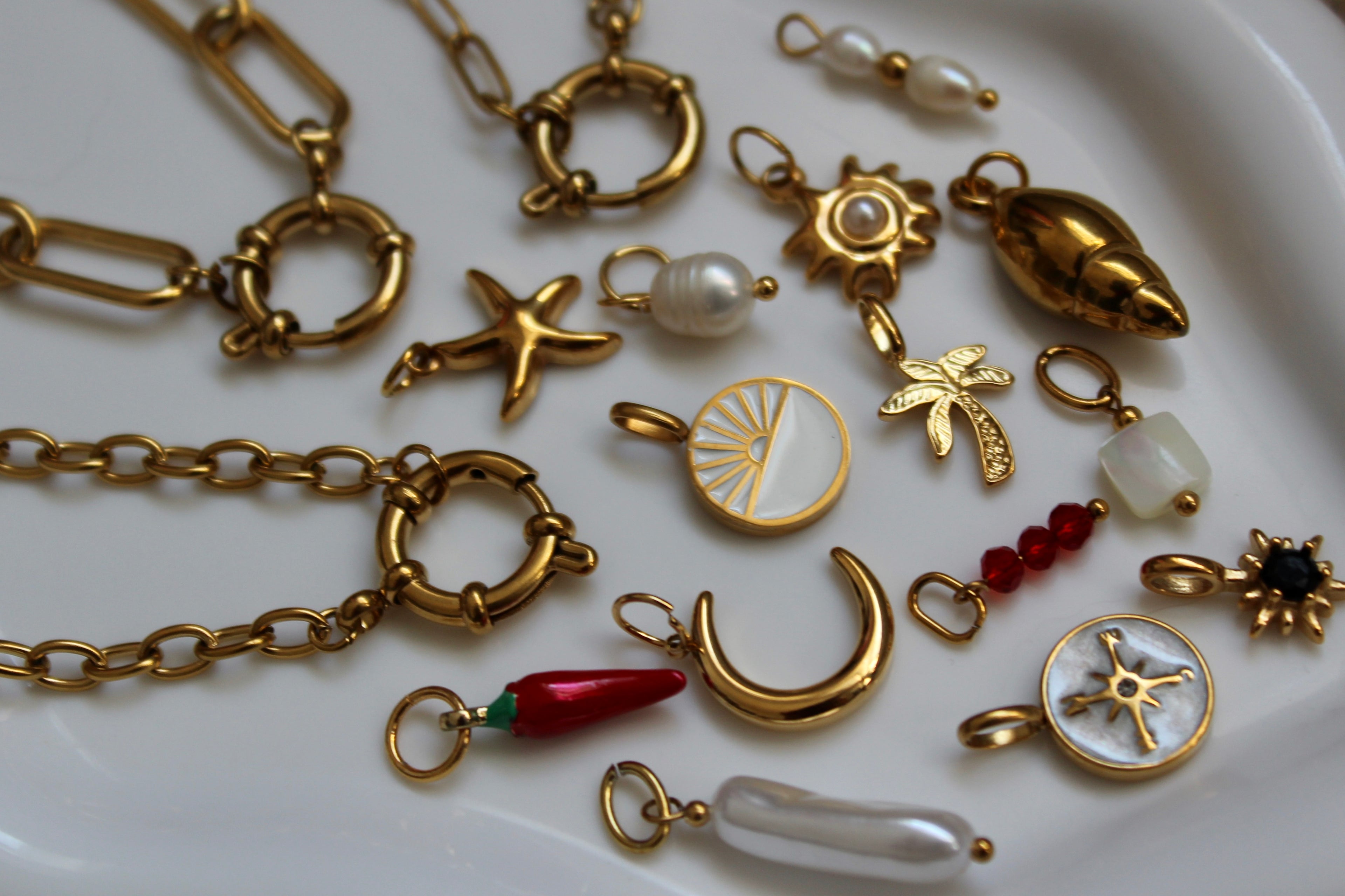 The Nyla 18K Gold Sailor Charm Paperclip Chain Necklace.