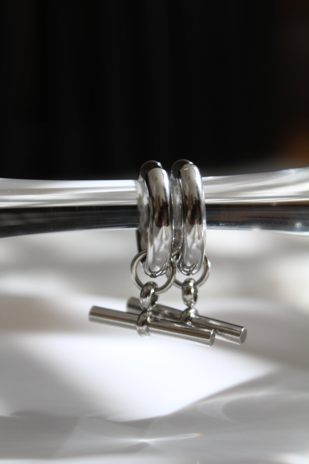The Silver T Bar Hoop Earrings.
