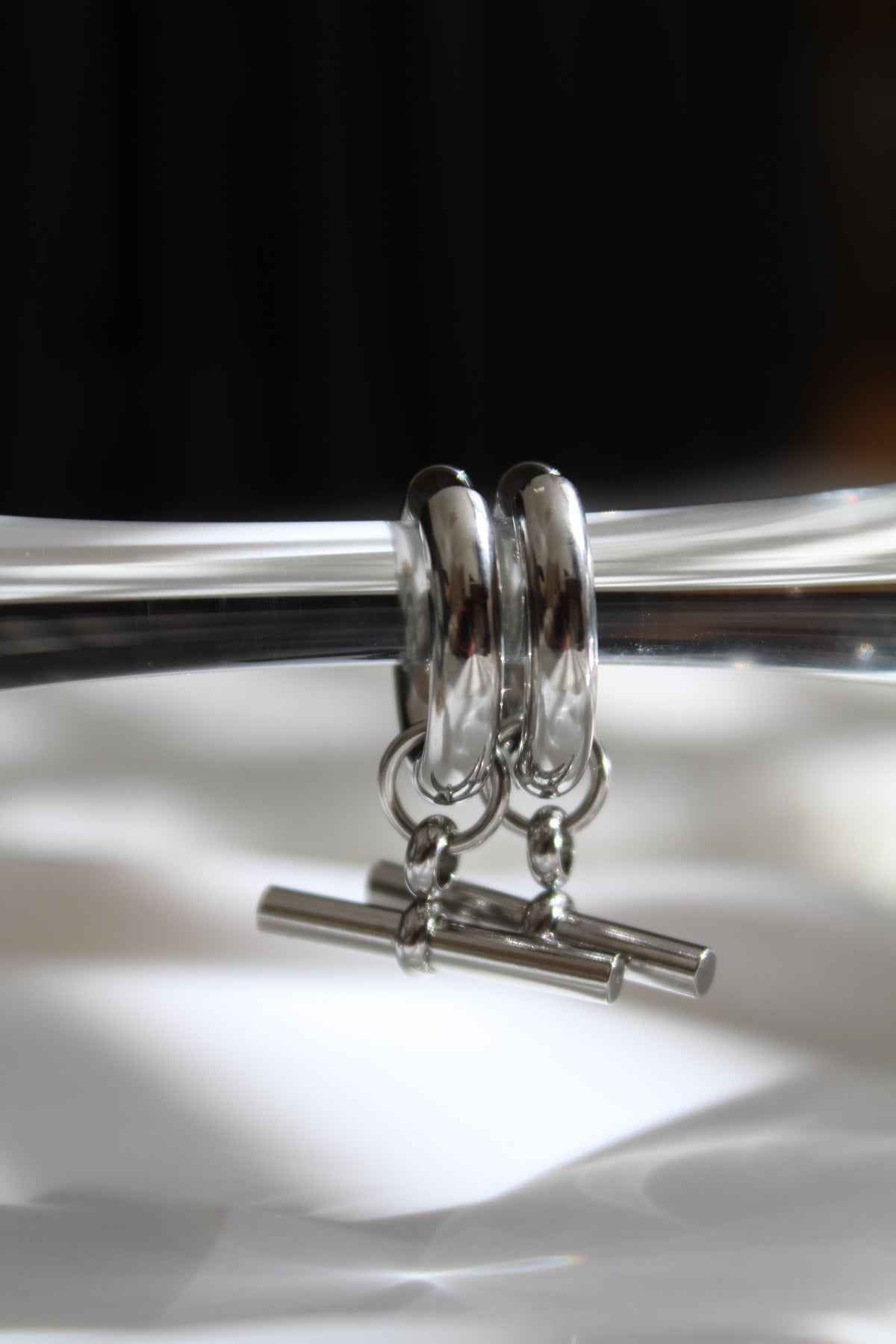 The Silver T Bar Hoop Earrings.