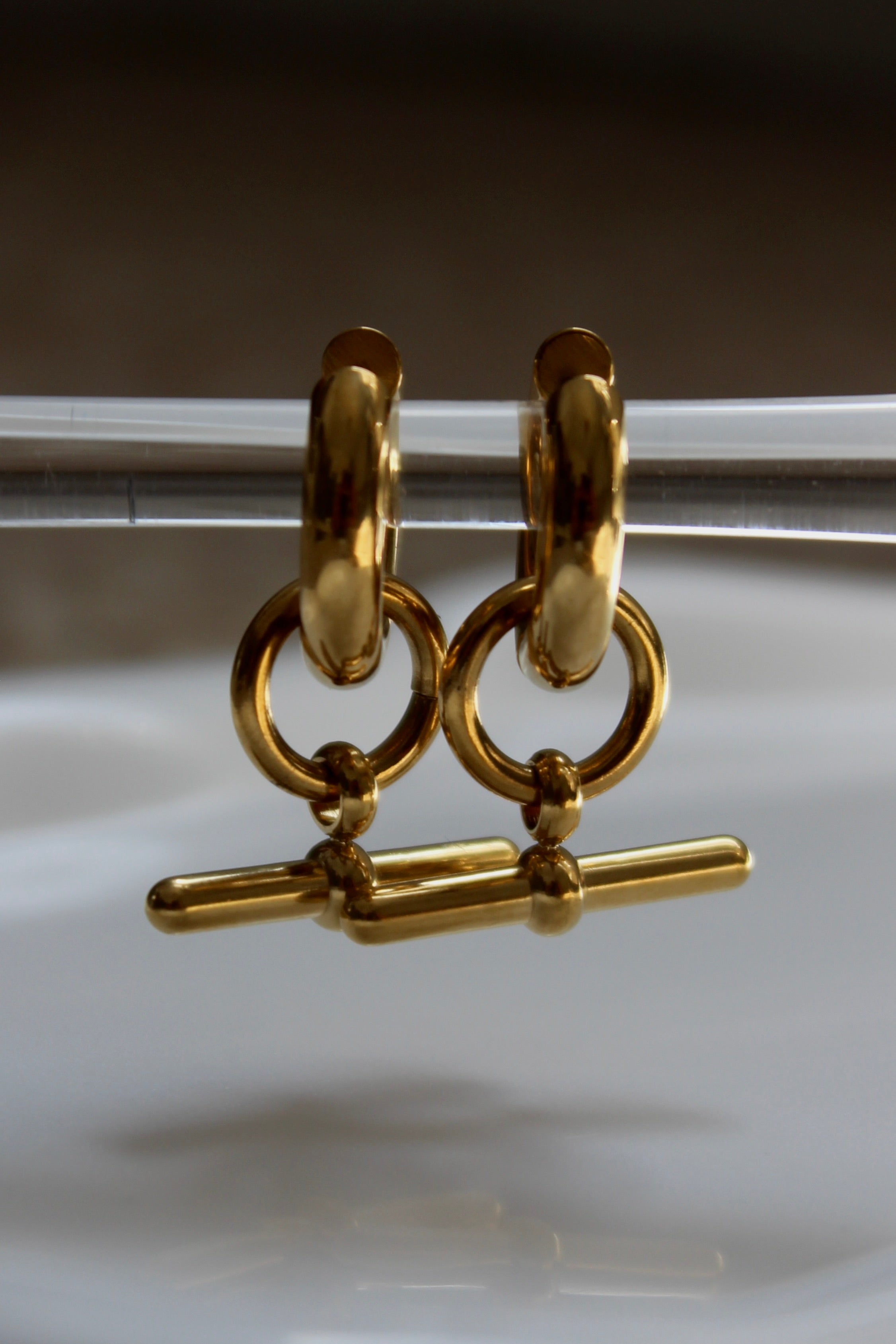 The Kelly T-Bar 18K Gold Hoop Earrings.