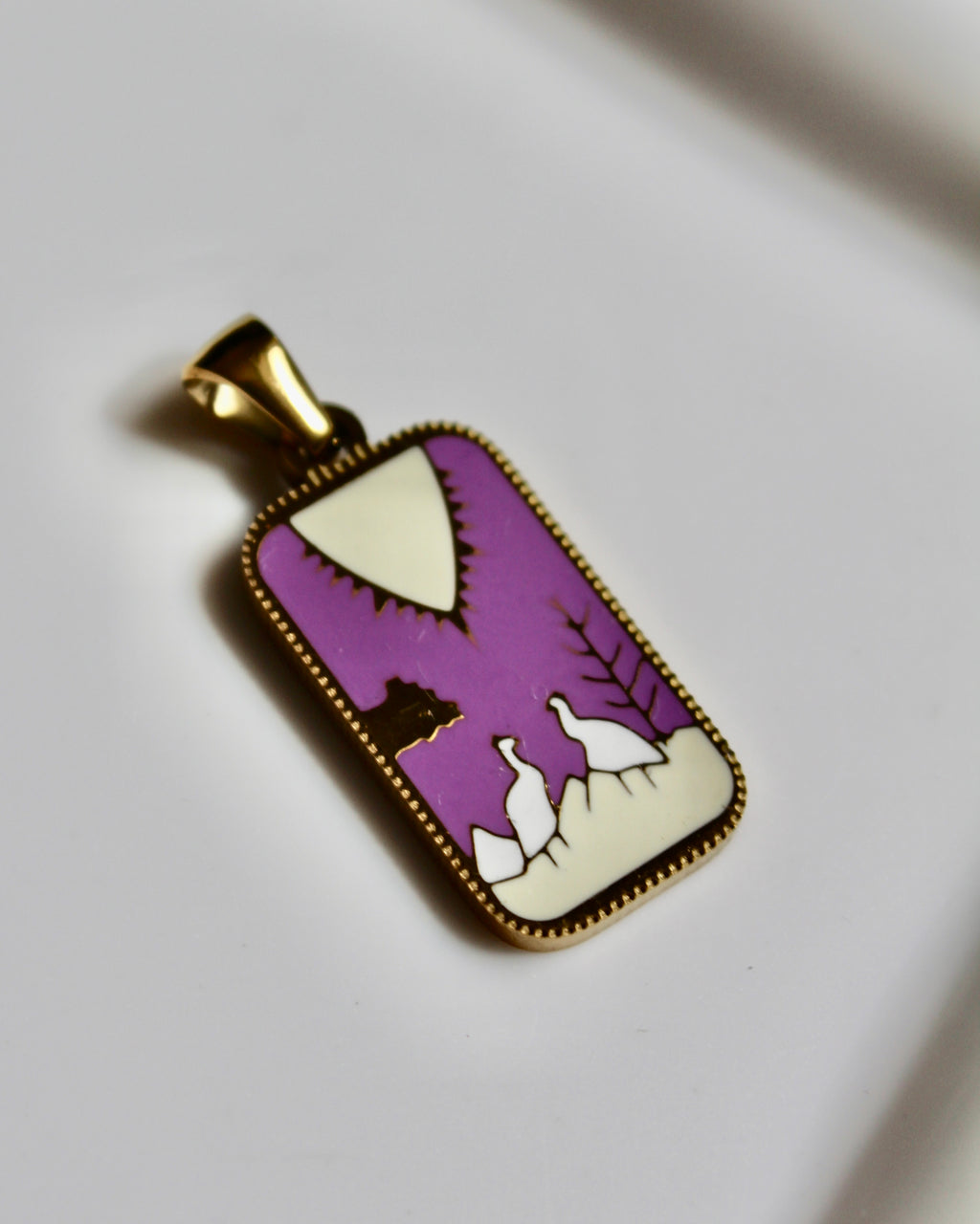 The Crane Charm.