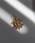 Abstract Gold Eye Dots Charm.