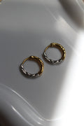 The Mixed Metal Hammered Harriet Hoop Mini Earrings.