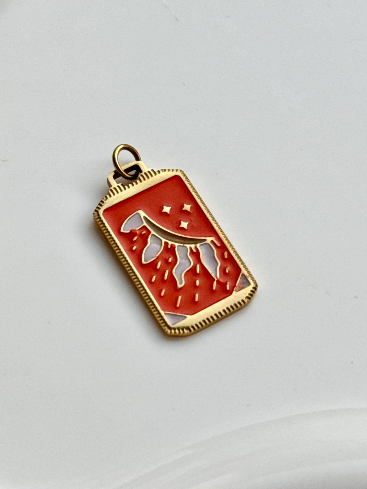 The Orange Wish Charm.