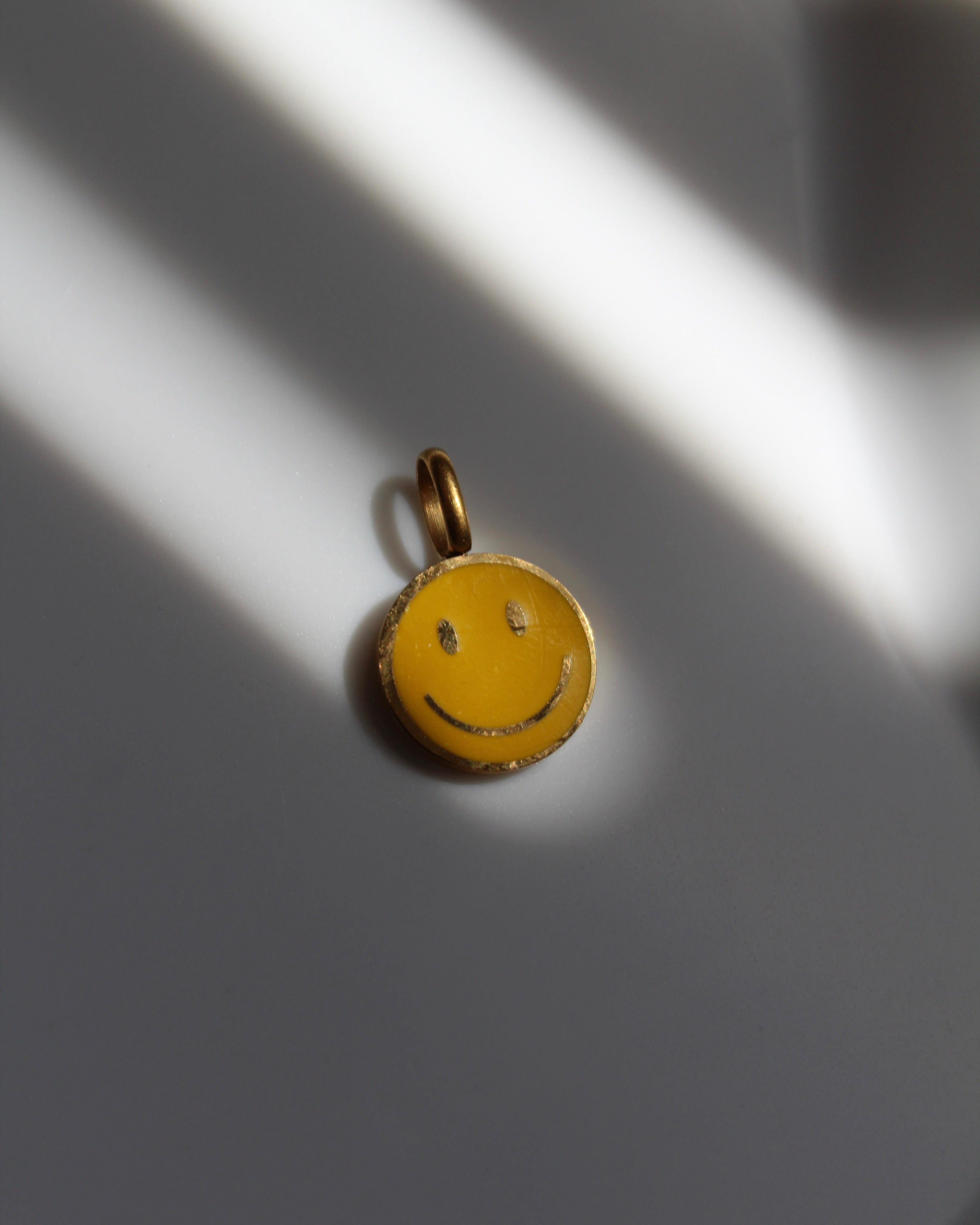 Yellow & Gold Smiley Face Charm.