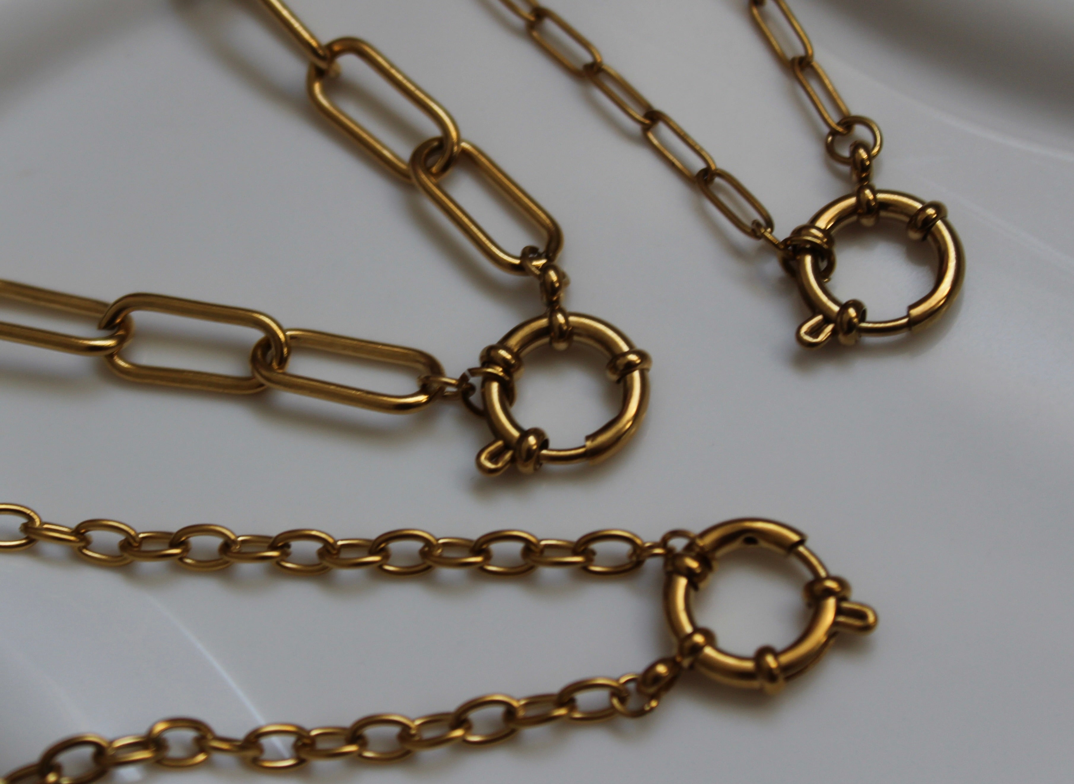 The Nyla 18K Gold Sailor Charm Paperclip Chain Necklace.