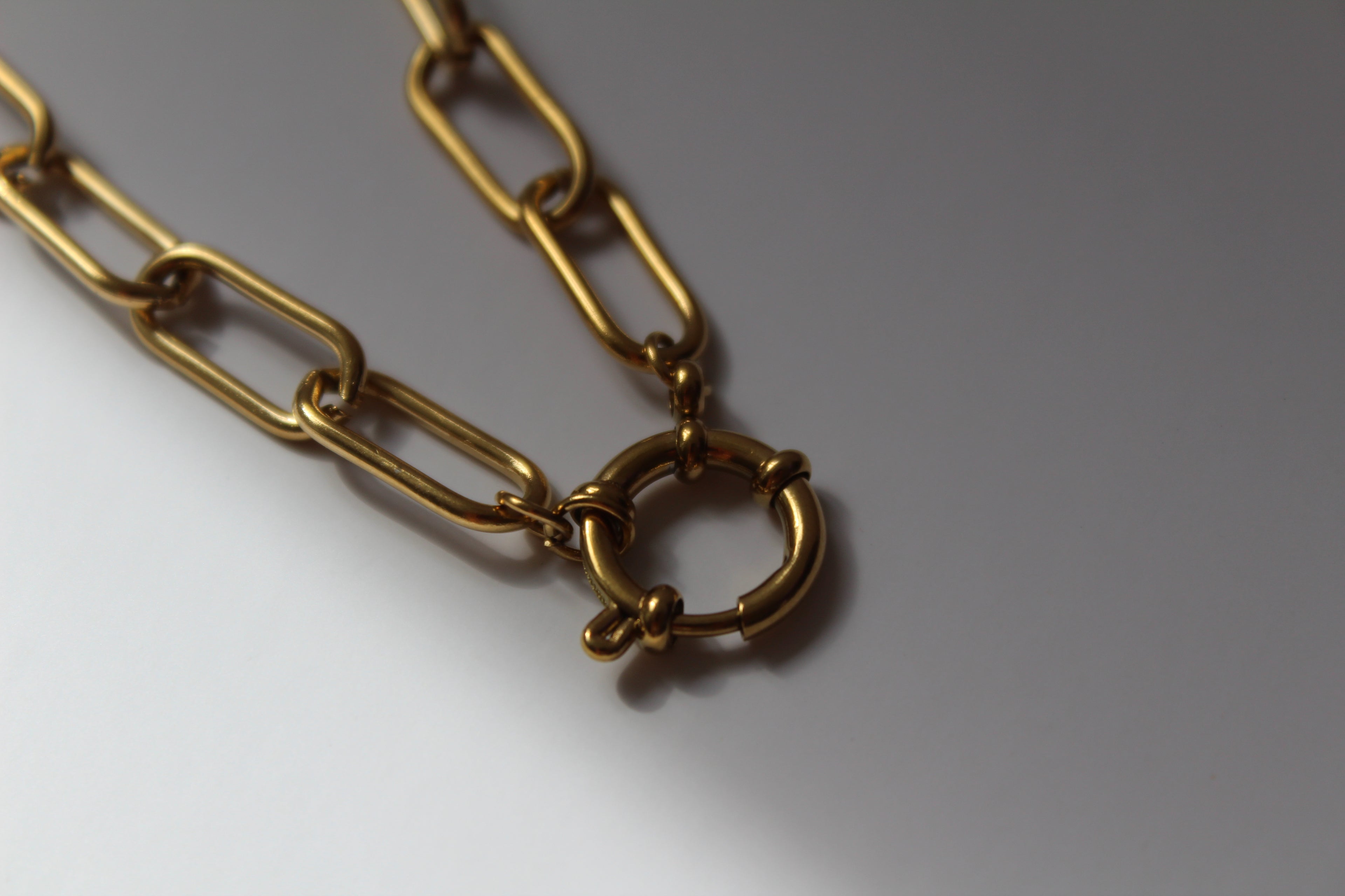 The Ingrid 18K Gold Sailor Charm Chunky Paperclip Chain Necklace.