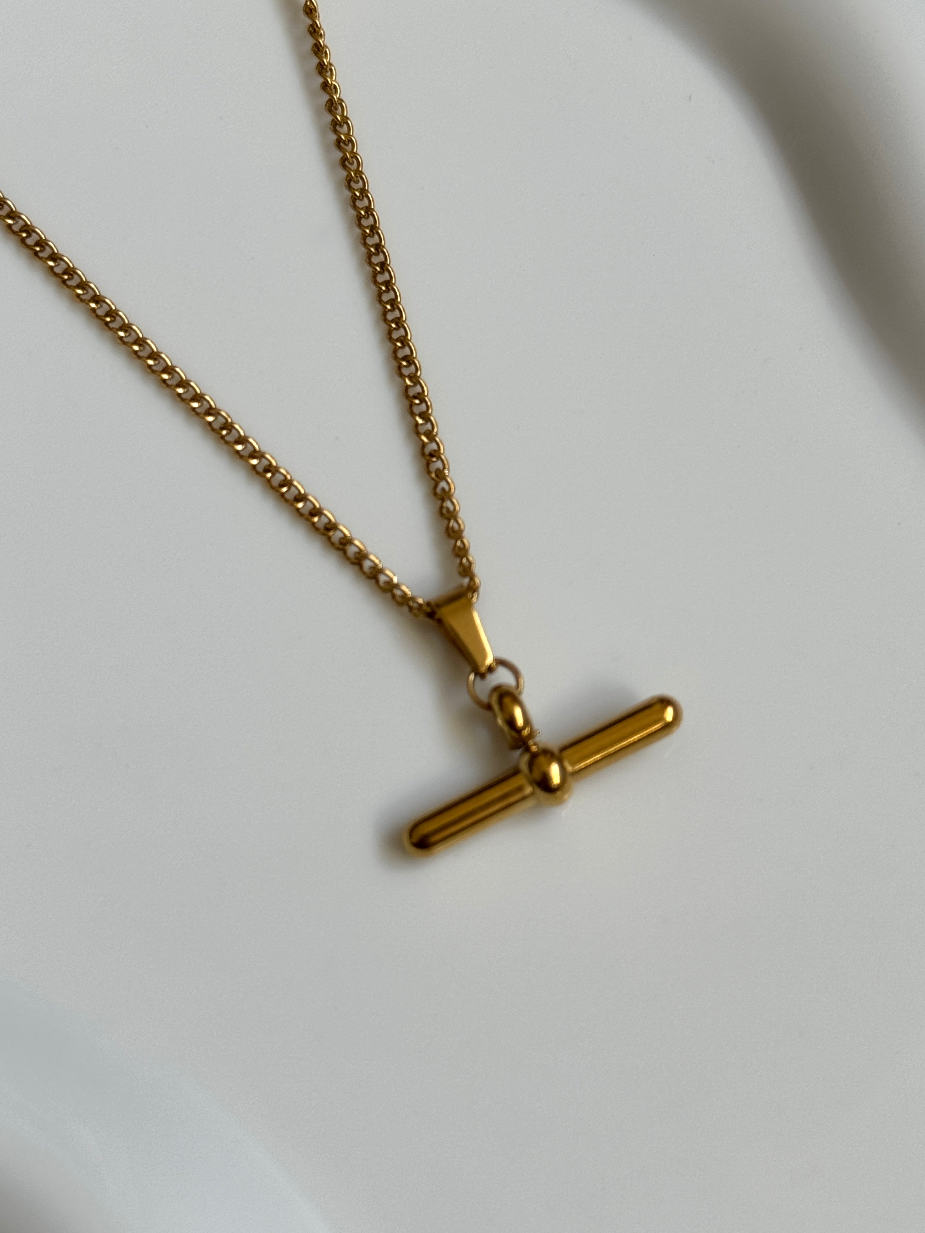 The Kelly T-Bar 18K Gold Necklace.