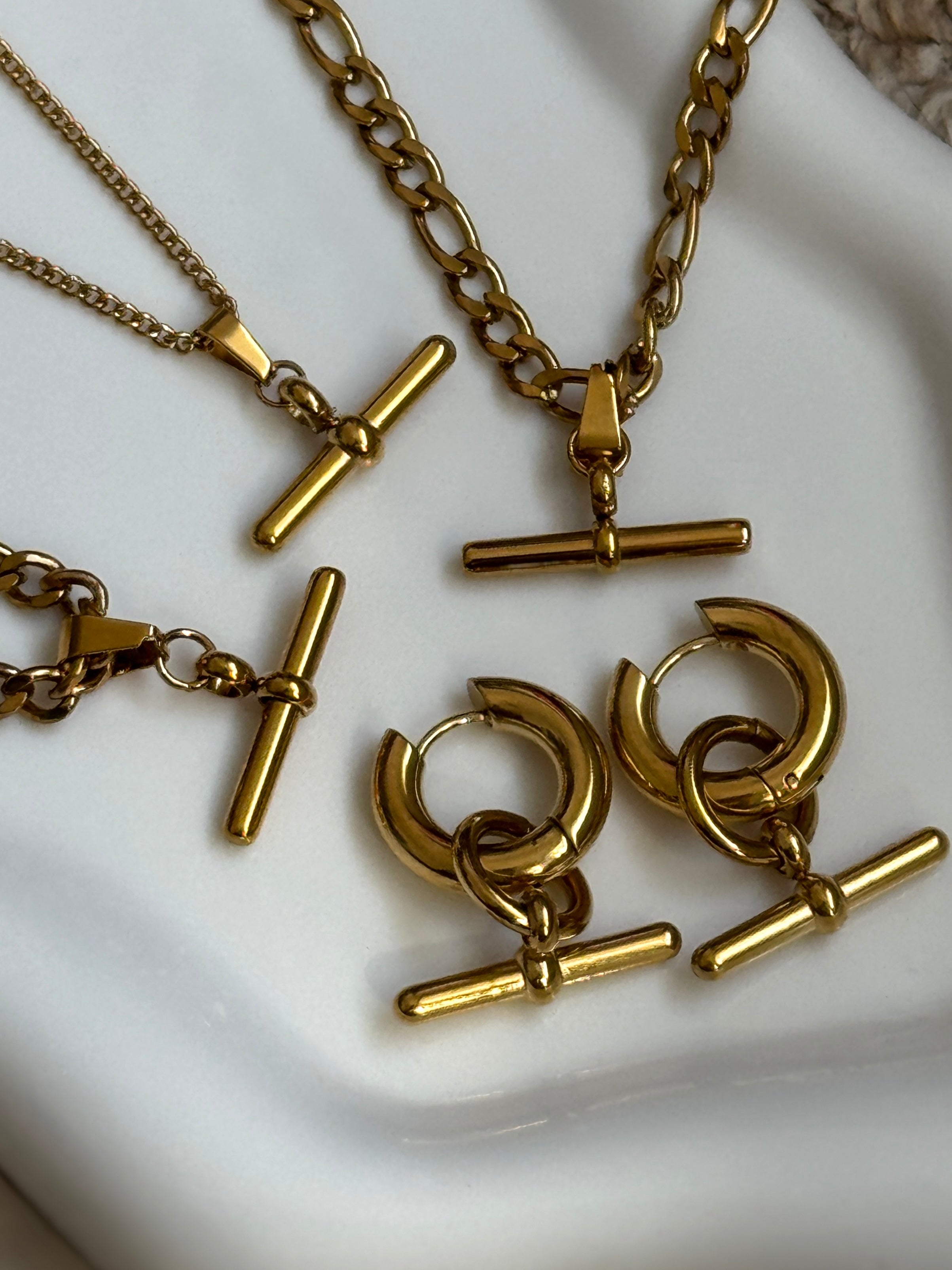 The Kelly T-Bar 18K Gold Hoop Earrings.