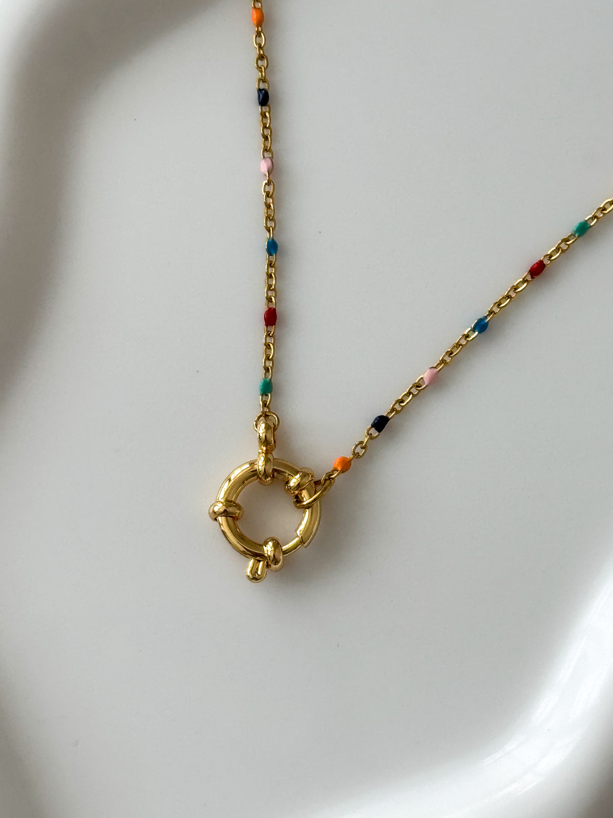 The Seren Confetti Sailor Charm Necklace.