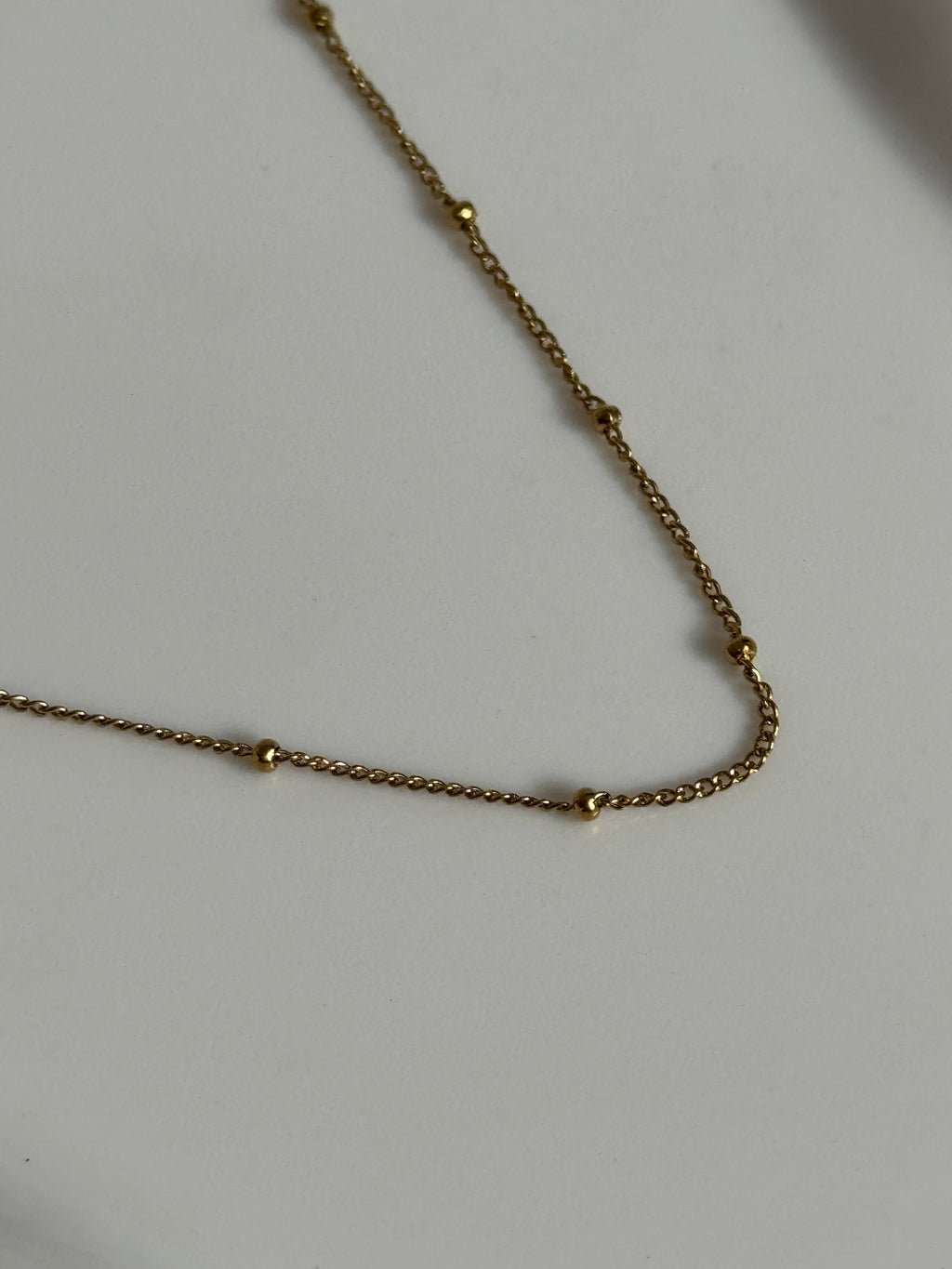 18K Gold Fine Beaded Stack Necklace.