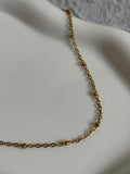 18K Gold Beaded Stack Necklace.