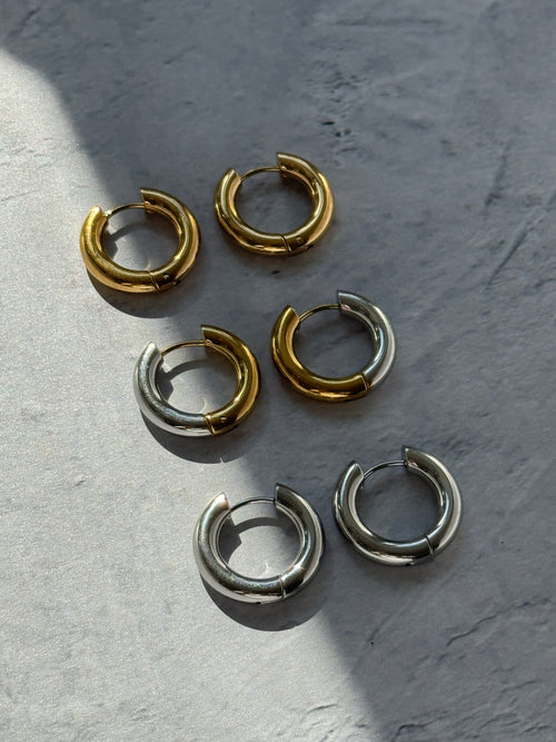 18K Gold Hoop Earrings.