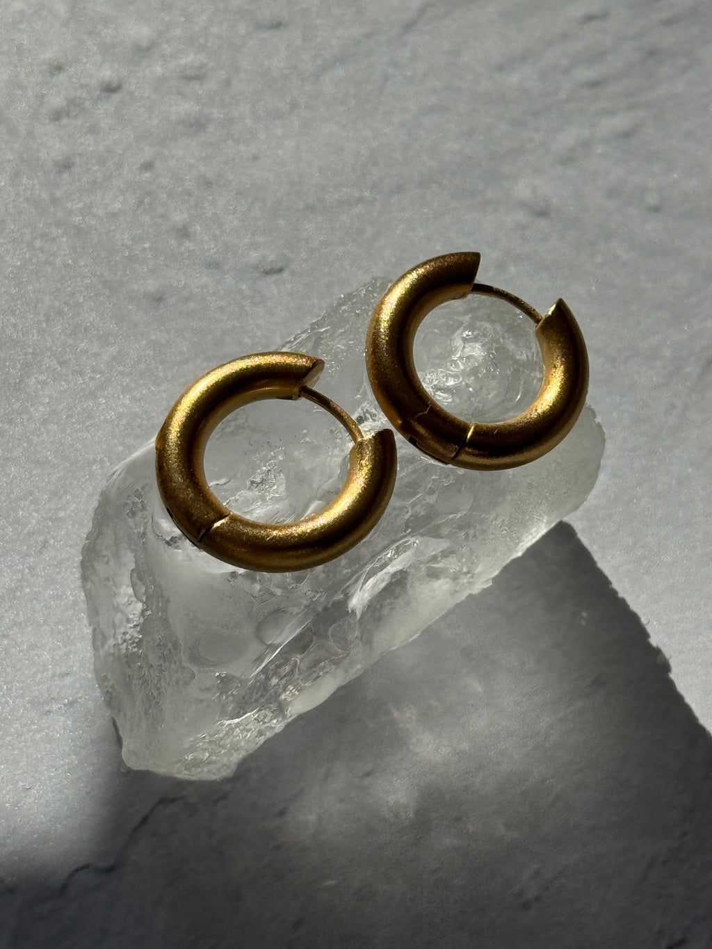 18K Gold Hoop Earrings.