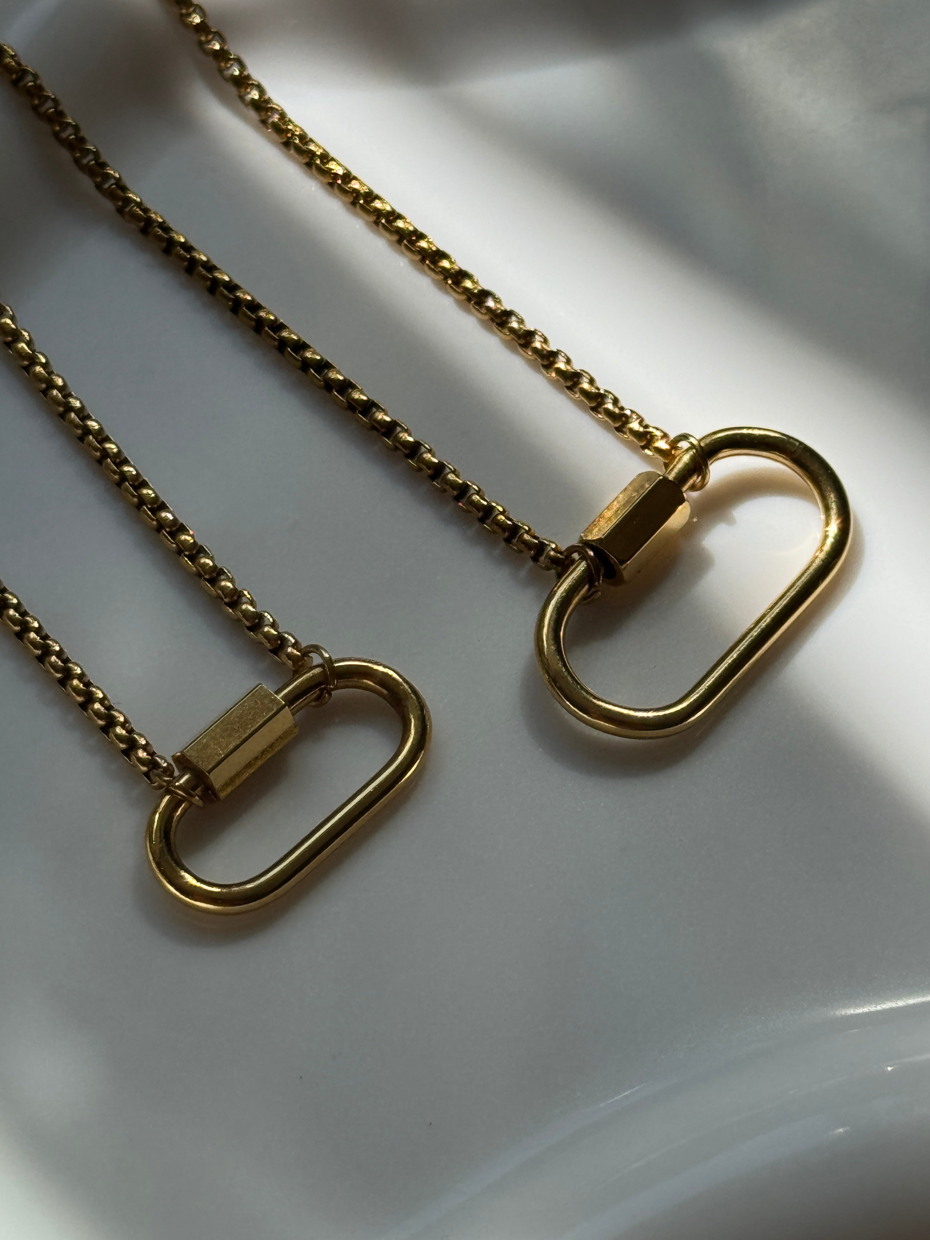 The Le-Le 18K Gold Carabiner Necklace.