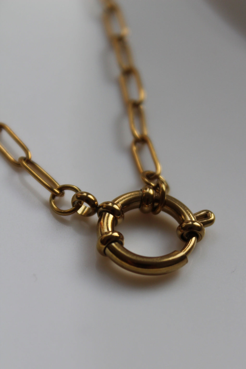 The Nyla 18K Gold Sailor Charm Paperclip Chain Necklace.