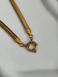 The Jenna 18K Gold Sailor Charm Snake Chain Necklace.